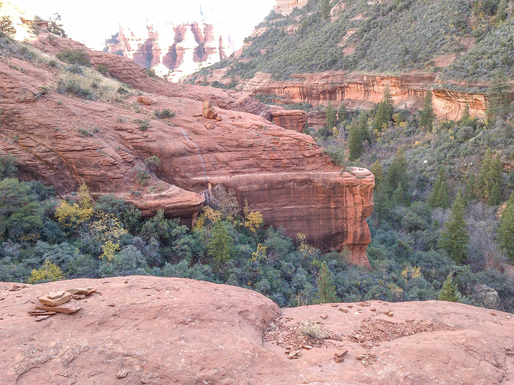 Scenic red rock formations along Boynton Canyon Trail in Sedona Arizona with desert vegetation