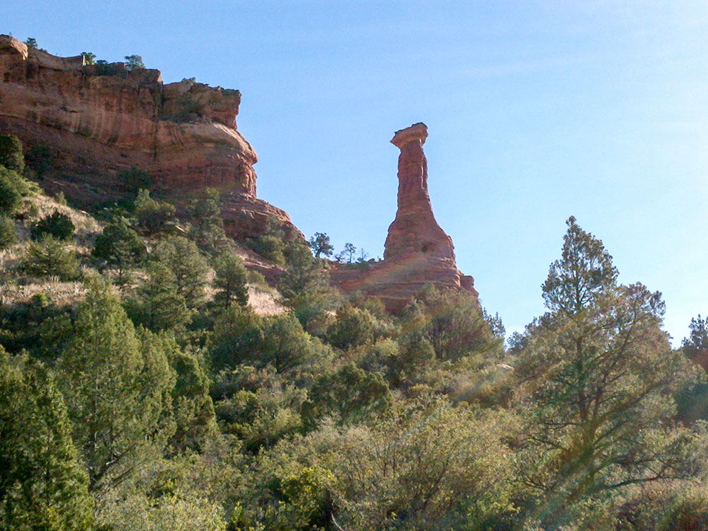 Wide canyon view on Boynton Canyon Trail Sedona Arizona with sandstone cliffs and greenery