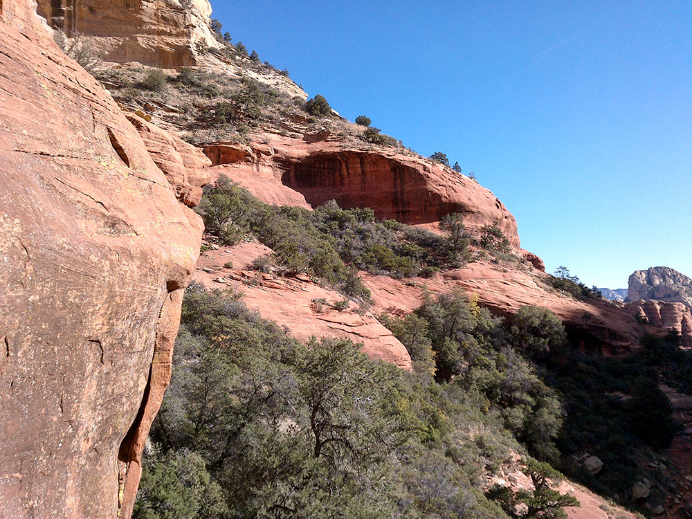 Panoramic view of Boynton Canyon Trail Sedona Arizona with blue sky and red rock canyon walls