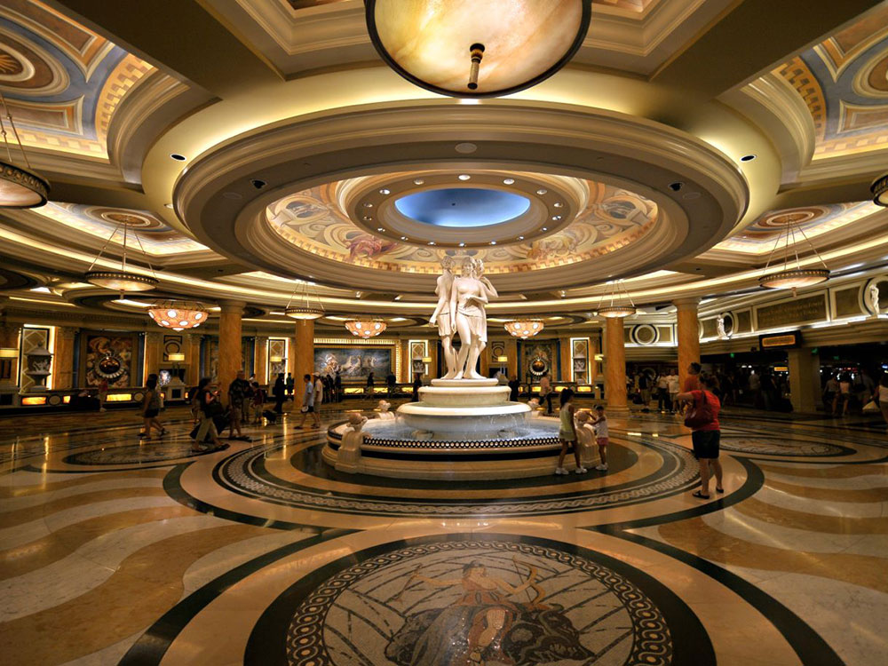 Grand interior lobby of Caesars Palace with ornate Roman-inspired decor, Las Vegas