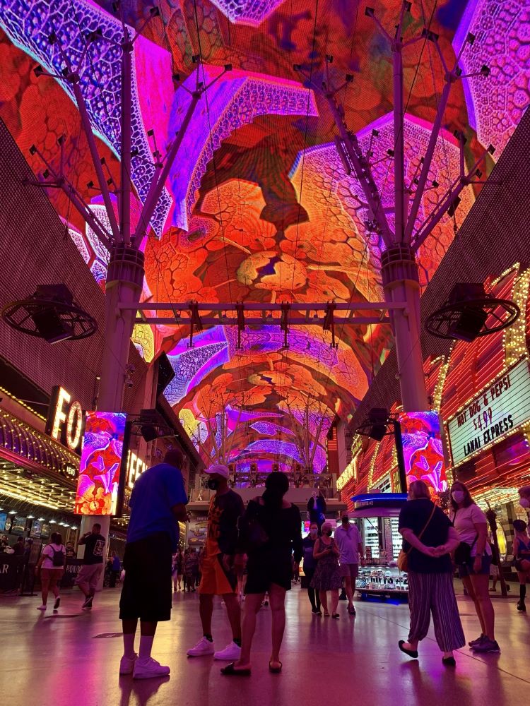 Pedestrians enjoying the Fremont Street Experience in downtown Las Vegas