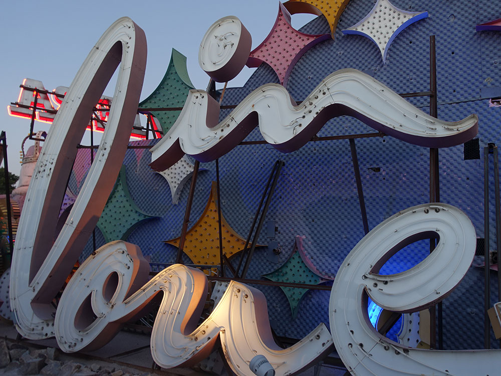 Illuminated vintage neon signs at the Neon Museum boneyard in Las Vegas