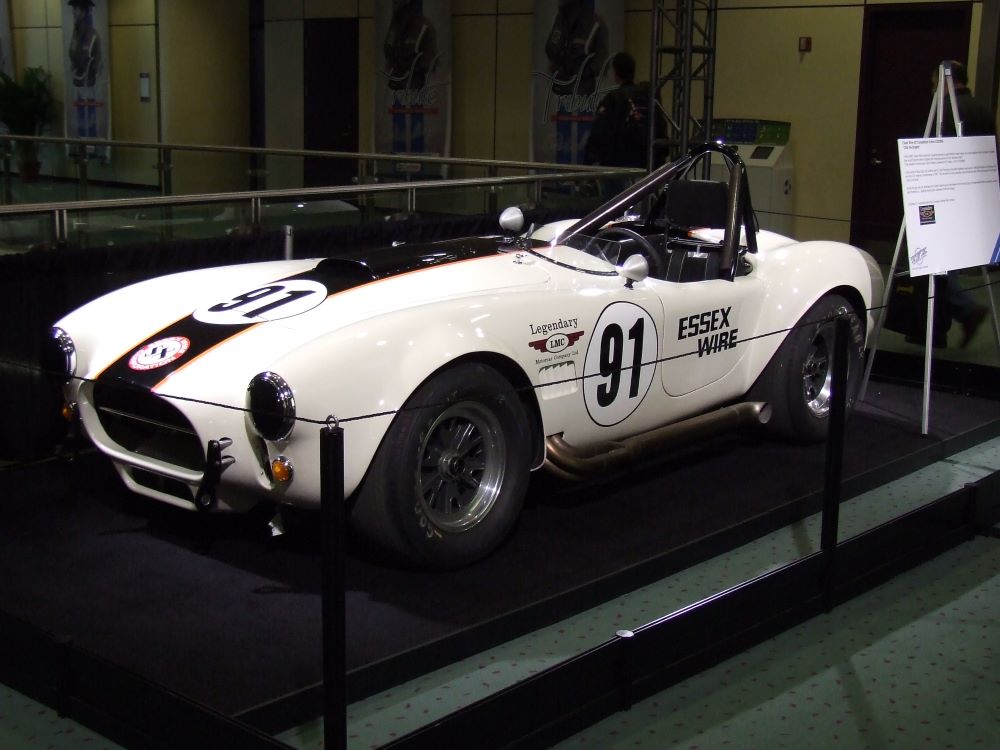 Shelby AC Cobra 427 with Ollie the Dragon mascot at Shelby Heritage Center Las Vegas