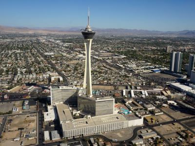 Aerial view of the STRAT Hotel Casino and SkyPod tower above the Las Vegas Strip
