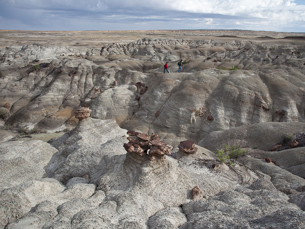 Desert terrain with colorful sandstone hoodoos at Ah-Shi-Sle-Pah Wilderness, New Mexico