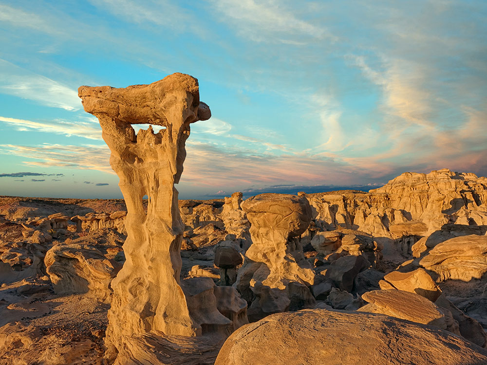 Alien Throne hoodoo rock formation rising from the desert badlands of Ah-Shi-Sle-Pah Wilderness, New Mexico