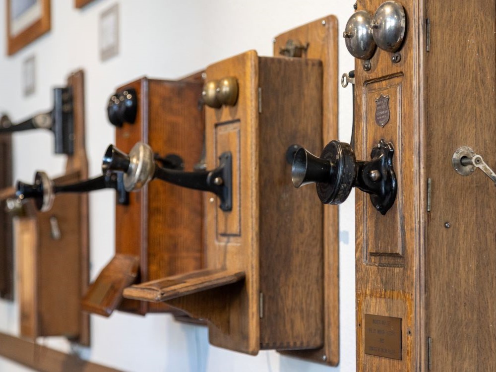 Collection of early telephones on display at the Telephone Museum of New Mexico in Albuquerque