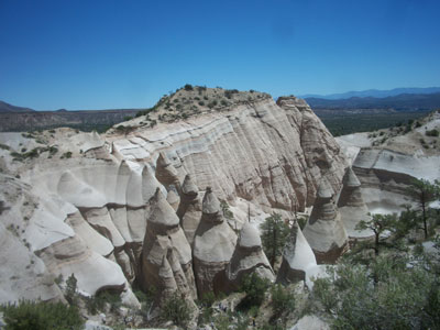Cone-shaped tent rock formations and canyon trail at Kasha-Katuwe Tent Rocks National Monument, New Mexico