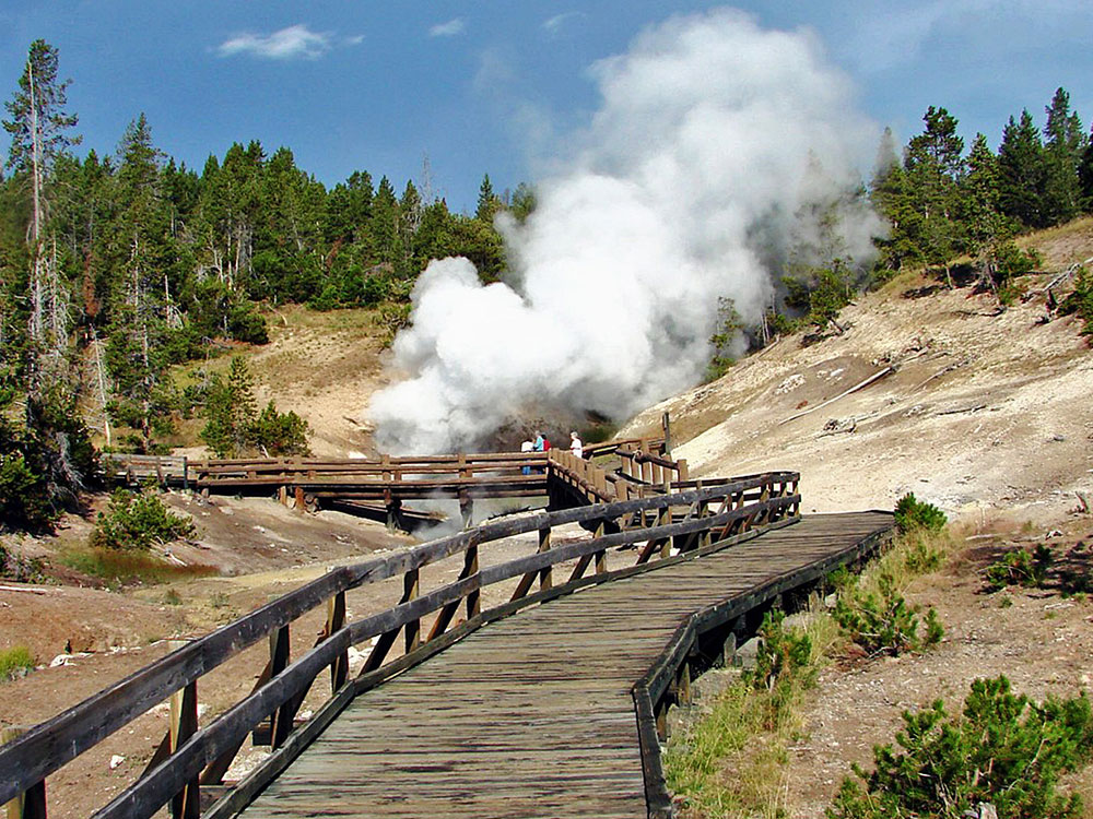 Dragon's Mouth Spring's steaming cave opening, Yellowstone