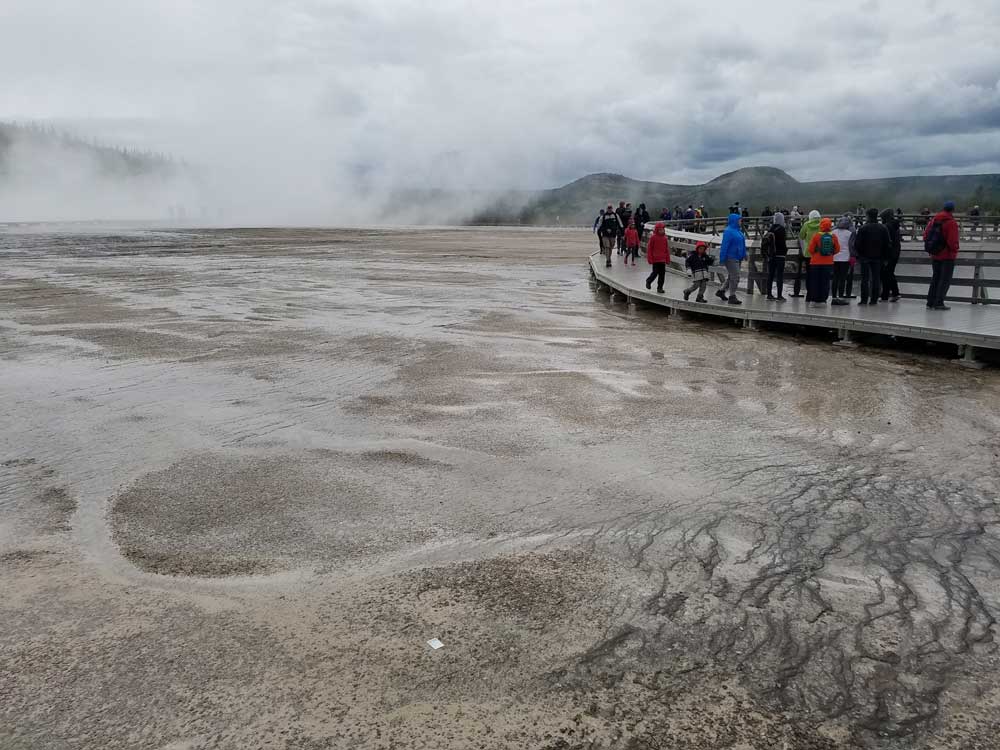 Visitors on the Grand Prismatic Spring boardwalk trail