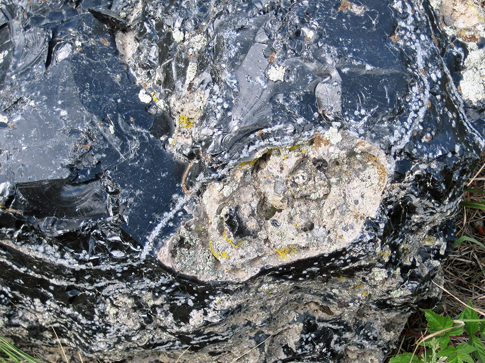 Close-up of devitrified rhyolitic obsidian with lithophysae, Obsidian Cliff