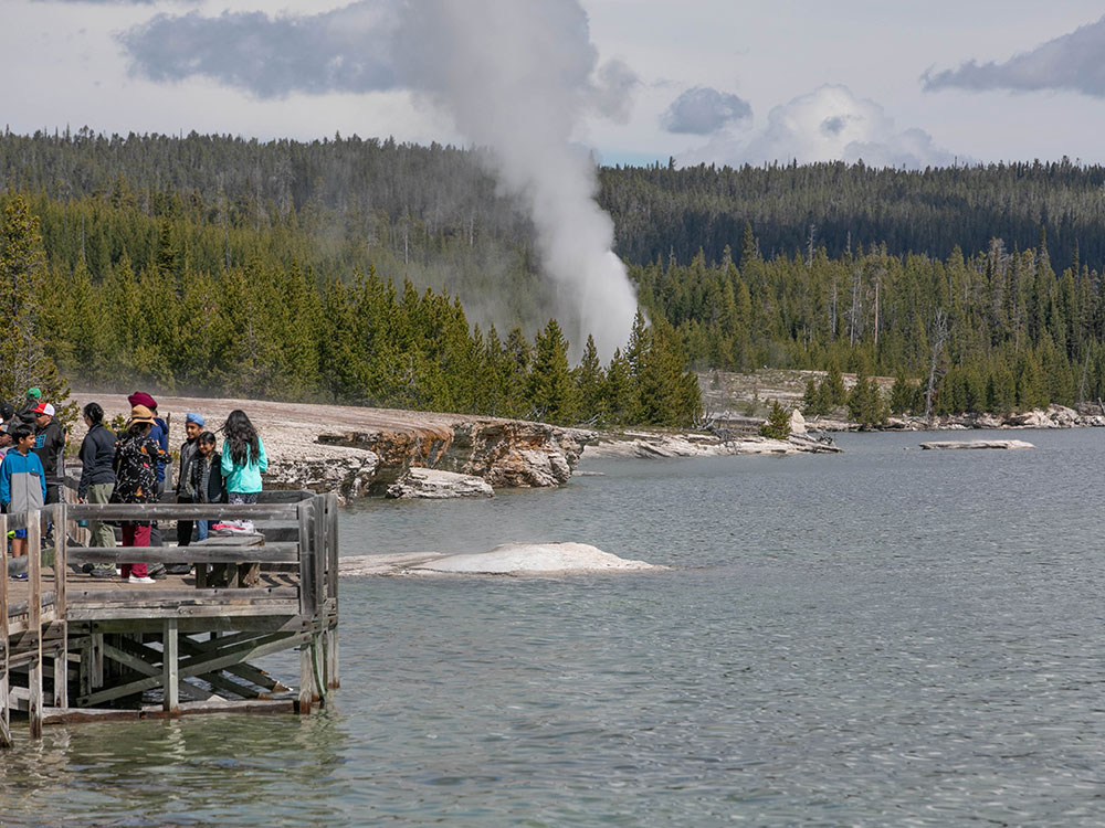 Geyser erupting along the shoreline of West Thumb Geyser Basin